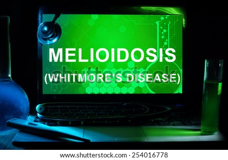 Computer with words   Melioidosis (Whitmores disease) . Test tubes, stethoscope and thermometer.