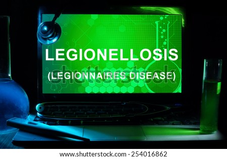 Computer with words Legionellosis (Legionnaires disease). Test tubes, stethoscope and thermometer.