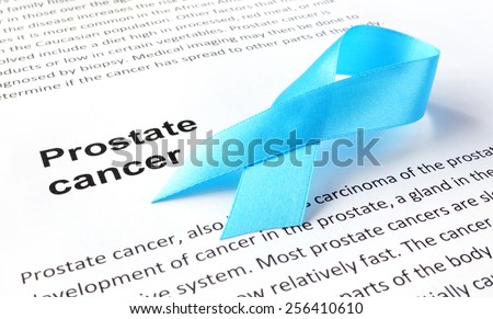 Paper with prostate cancer and light blue ribbon