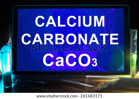 Tablet with chemical formula of calcium carbonate .