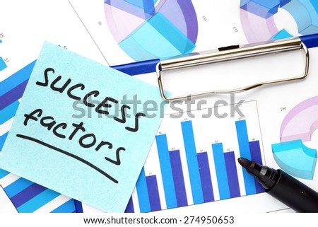 Paper with words success factors and graphs.