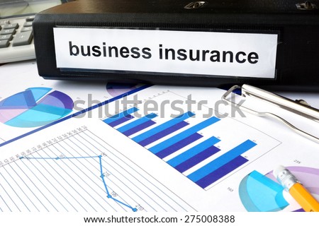 Folder with the label business insurance and charts