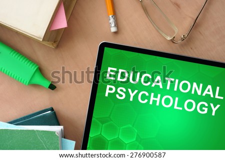 Books and tablet with words educational psychology