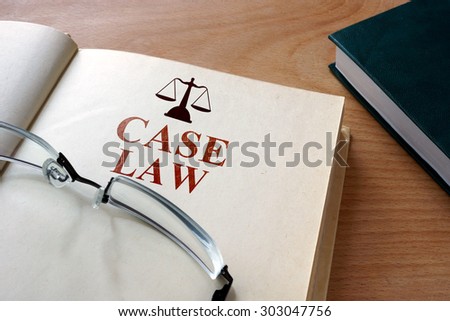 Code of case  law on a wooden table.
