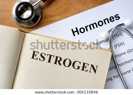 Estrogen  word written on the book and hormones list.