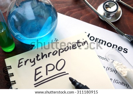 Hormone erythropoietin  written on notebook. Test tubes and hormones list.