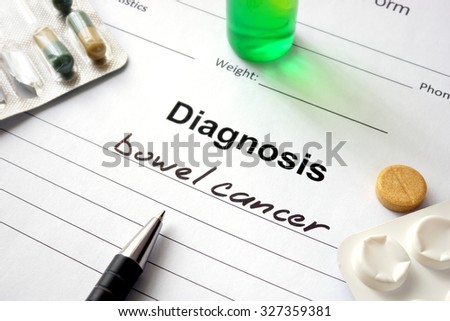 Diagnosis bowel cancer written in the diagnostic form and pills.