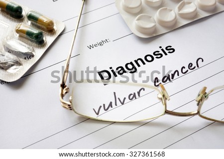 Diagnosis vulvar cancer written in the diagnostic form and pills.