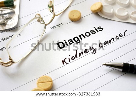 Diagnosis kidney cancer written in the diagnostic form and pills.