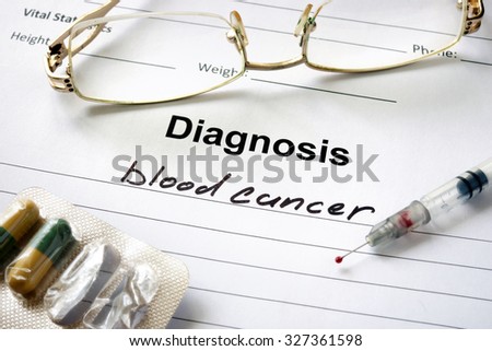 Diagnosis blood cancer written in the diagnostic form and pills.