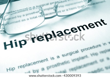 Hip replacement written on a page. Medical concept.