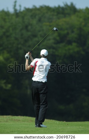 man golfer doing a swing
