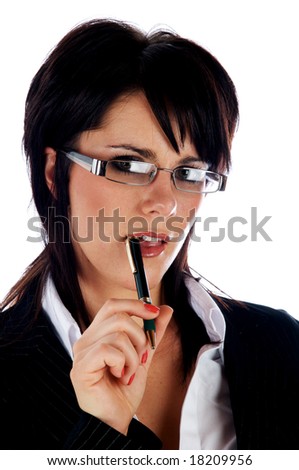 Business woman looking at camera with pen in her mouth