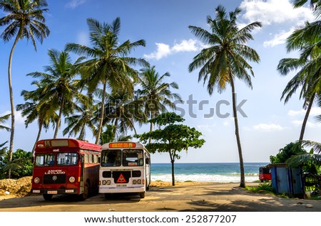 DIKWELLA, SRI LANKA - JANUARY 2, 2015: Regular public bus near the beach in Dikwella. Buses are the Sri Lankan principal mode of public transport.
