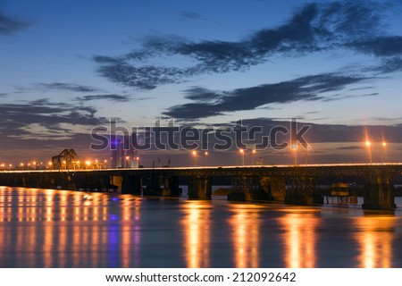 HDR of Long Bien bridge at sunset. Long Bien Bridge is a historic cantilever bridge across the Red River that connects two districts, Hoan Kiem and Long Bien
