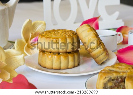 Moon cake, food for Chinese and Vietnamese mid-autumn festival. The shapes on moon cake are traditionally popular, and made by wooden mold