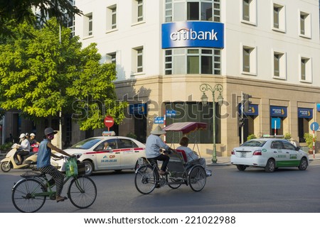 Hanoi, Vietnam - Sept 14, 2014: traffic on Trang Tien st in front of Citibank office