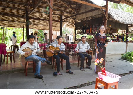 Can Tho, Vietnam - May 18, 2013: Artists perform music and song to tourists. The art is an indispensable part of the spiritual activity and cultural heritage of the people of southern Viet Nam