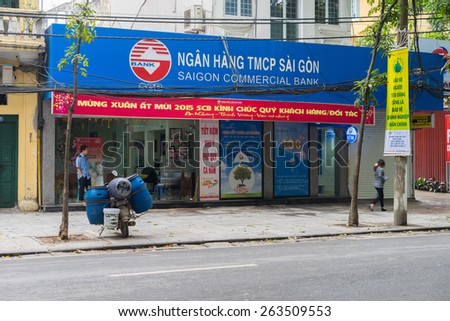 Hanoi, Vietnam - Mar 15, 2015: Exterior front view of closing Saigon Commercial Bank on Lo Duc street