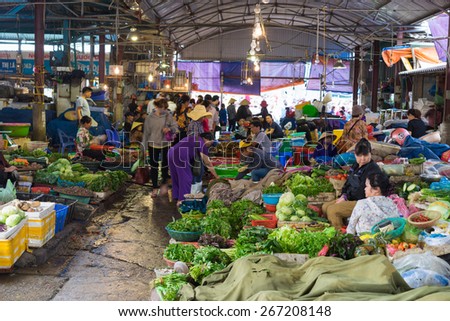 Quang Ninh, Vietnam - Mar 22, 2015: View of Ha Long rural market with vegetable stalls