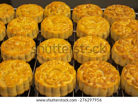 Vietnamese mid autumn festival cake. Mooncakes are traditional pastries eaten during the Mid-Autumn Festival. The festival involves family getting together to share mooncakes while watching the moon