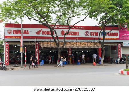 Hanoi, Vietnam - Apr 28, 2015: Front exterior view of motorbike service store in Cau Giay street