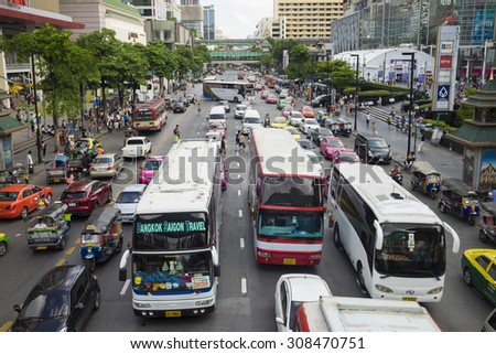 Bangkok, Thailand - June 29, 2015: Traffic jam along a busy road near Central World building. Traffic jam is a serious problem of Bangkok