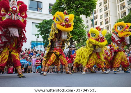 Hanoi, Vietnam - Sep 25, 2015: A show of lion dance at Times City complex in Vietnamese mid autumn festival days