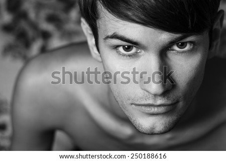Close up of male head shot. Top view. Black and white portrait.