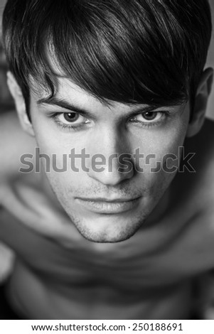 Close up of male head shot.  Black and white portrait.