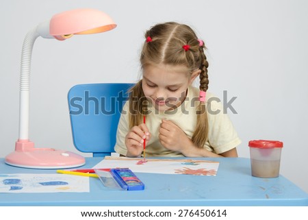 Six year old girl on a drawing lesson