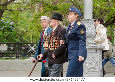 Volgograd, Russia - may 07, 2015: employee of Ministry Emergency Situations holds event on festive veteran