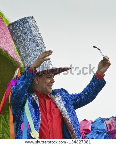 SANTO DOMINGO, DOMINICAN REPUBLIC - MARCH 3: Merengue music singer Fernando Villalona greets fans during Sto Domingo Carnival on March 3, 2013 in Santo Domingo, Dominican Republic.