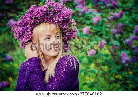 Woman portrait with a diadem of lilac