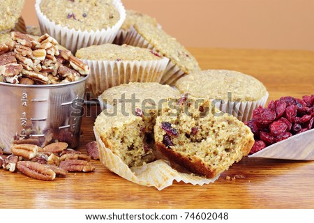 Oatmeal Cranberry Muffins made with dried cranberries, oats, whole wheat flour, pecans and dried cranberries.