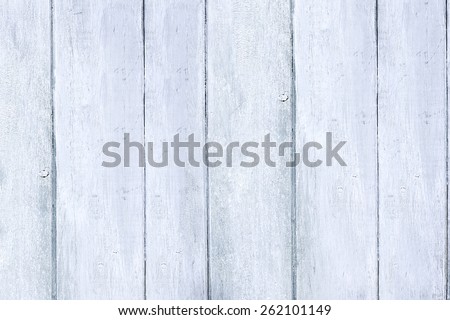 Blue wood planks background with studio lighting.