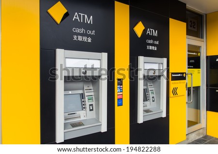 MELBOURNE, AUSTRALIA - May 25, 2014: Automated teller machines of the Commonwealth Bank of Australia, Australia\'s largest and the world\'s 10th largest bank by market capitalization (US$115 billion).