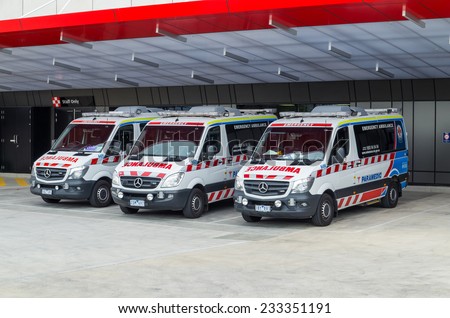 MELBOURNE, AUSTRALIA - November 20, 2014: Ambulance Victoria paramedic ambulance outside Box Hill Hospital emergency department. Ambulance Victoria uses mainly Mercedes Benz Sprinter vans.