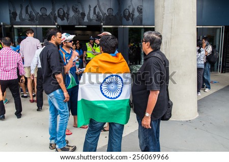 MELBOURNE, AUSTRALIA - February 22, 2015: Indian cricket fans outside the Melbourne Cricket Ground before the India v South Africa 2015 Cricket World Cup match.