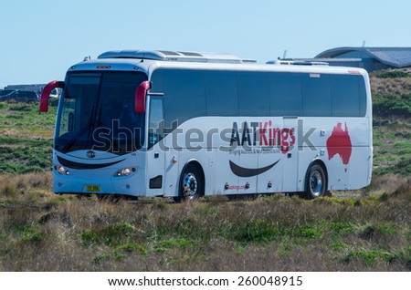 PHILLIP ISLAND, AUSTRALIA - March 8, 2015: AAT Kings tourist bus on Phillip Island, a popular tourist destination. AAT Kings operates 80 tour buses in Australia and New Zealand.