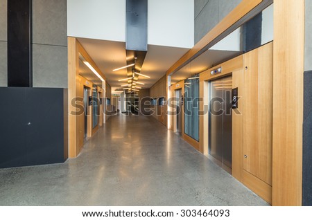 Melbourne, Australia - August 2, 2015: elevators in the refurbished Robert Menzies Building on the Clayton campus of Monash University. The elevators connect the 11 storeys of the building.