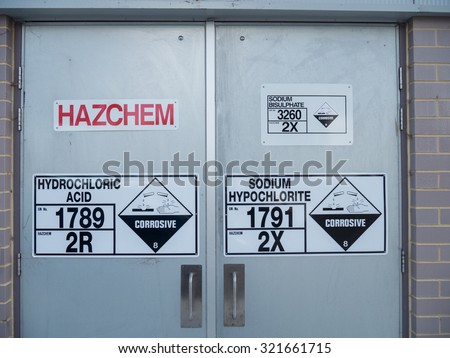 Melbourne, Australia - September 25, 2015: Hazardous chemicals warning sign on a service entrance to Aqualink swimming pool in Box Hill.