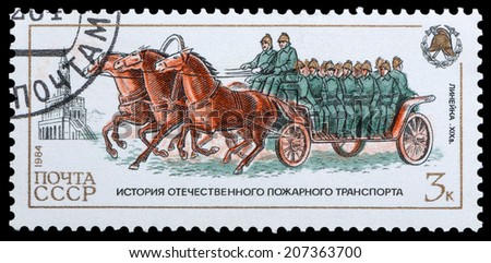 USSR-CIRCA 1984: A post stamp printed in USSR show firemen , devoted history of fire transport, circa 1984.