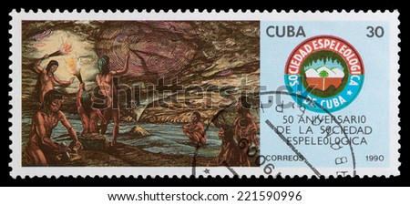 CUBA - CIRCA 1990: A stamp printed in Cuba shows the primitive people and the rock carvings, circa 1990