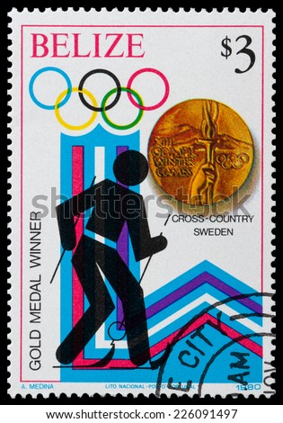 BELIZE - CIRCA 1980: a stamp printed in Belize shows the gold medal in cross country, Winter Olympics, Portugal, circa 1980