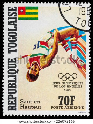 TOGO - CIRCA 1984: A stamp printed in Togo shows the high jump, series Olympic games in Los Angeles, circa 1984