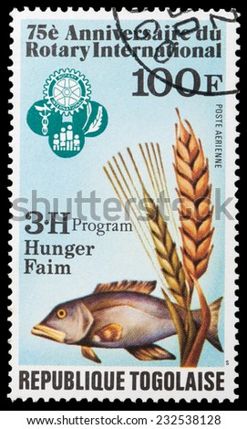 TOGO - CIRCA 1980: a stamp from Togo shows image of a fish and commemorates the food security work of Rotary International, circa 1980