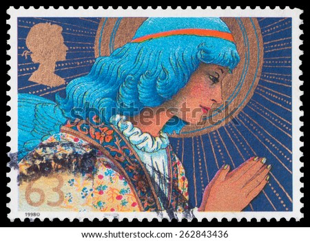 UNITED KINGDOM - CIRCA 1998: A stamp printed in Great Britain shows image of an angel, nativity, circa 1998