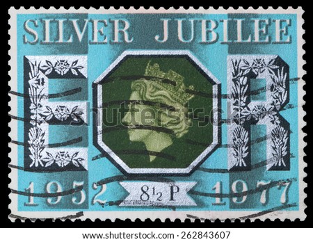UNITED KINGDOM - CIRCA 1977: A British stamp commemorating the Silver Jubilee of Queen Elizabeth II, circa 1977.