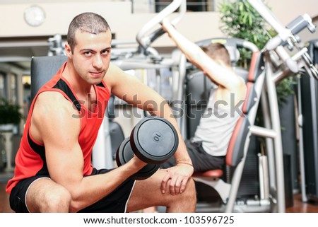 Man training in a fitness club